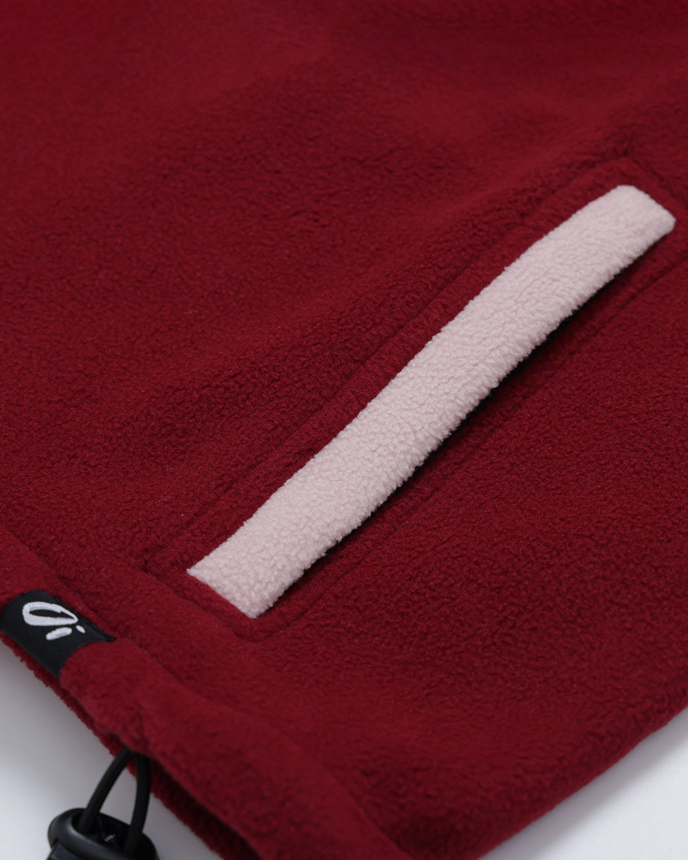 Close-up of Wild Mulberry Pocket Fleece on a white background