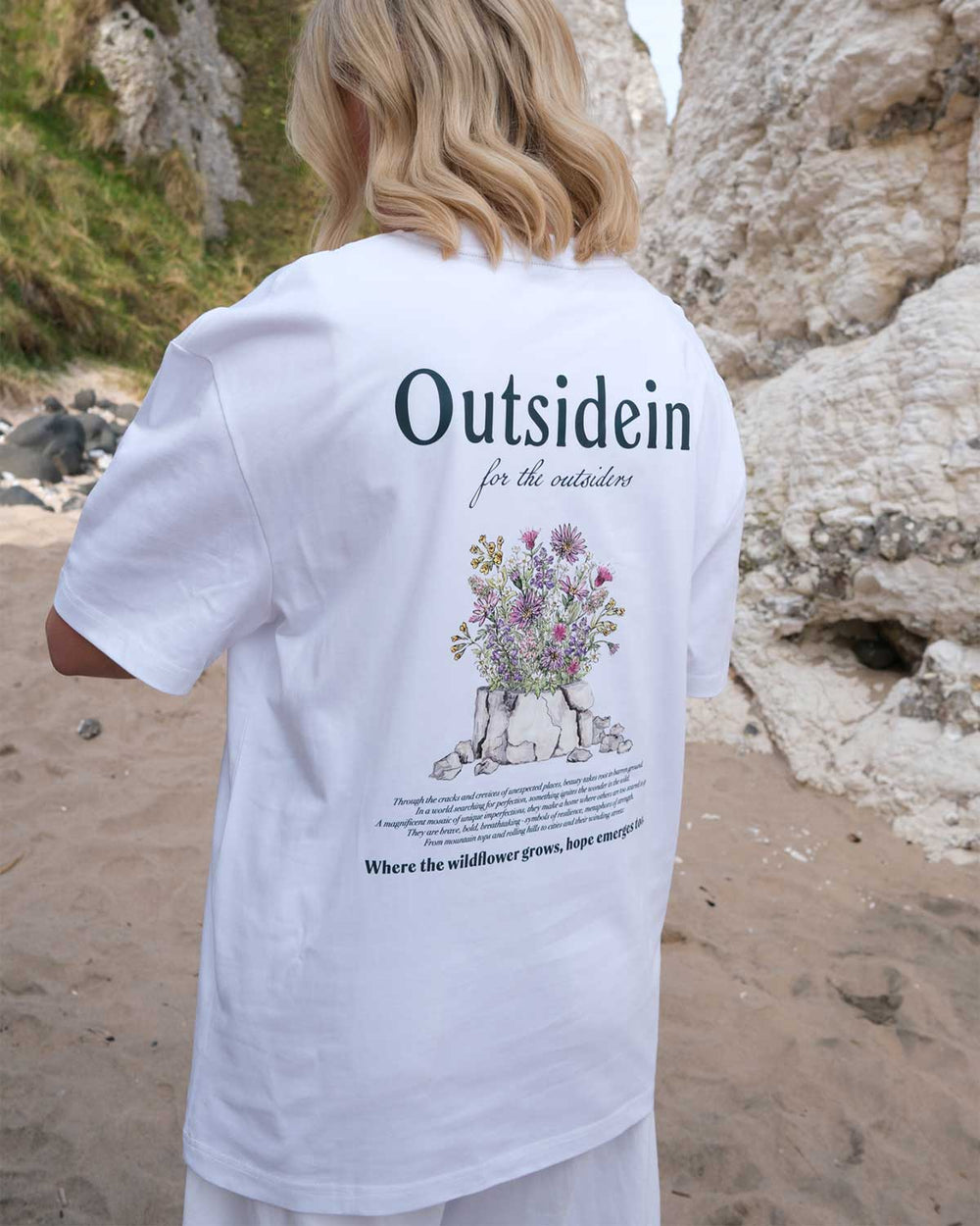Back view of model wearing White Wildflower T shirt