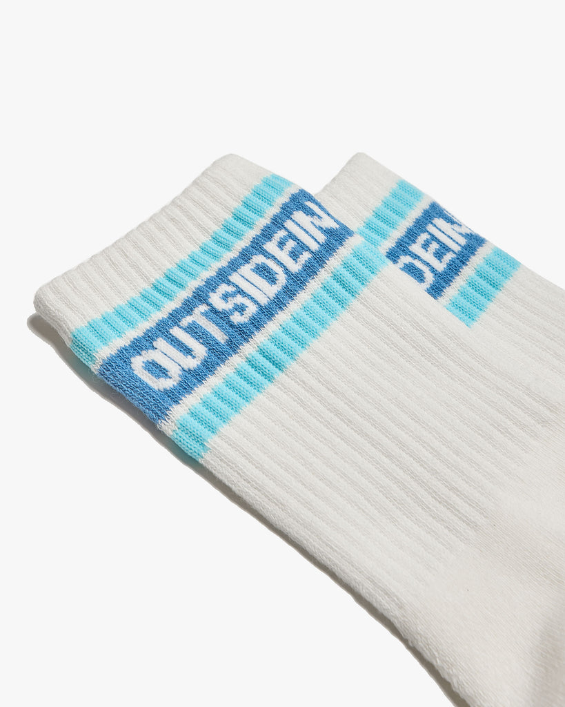 A pair of Cloud dancer socks in blue, soft fabric, cushioned snug fit