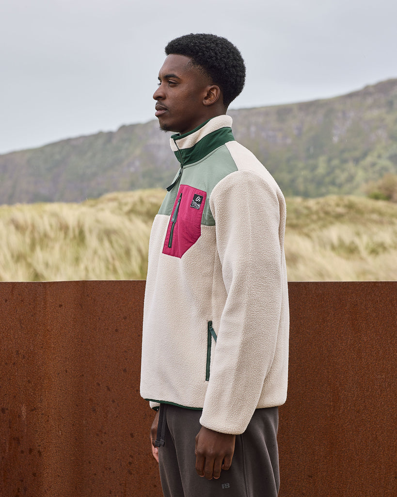 Oatmeal and Sage borg fleece with 1/4 zip, nylon contrast, and side pockets