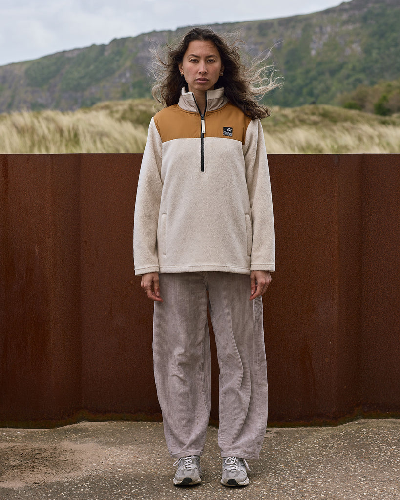 Oatmilk & Walnut borg fleece with 1/4 zip, nylon contrast, and side pockets