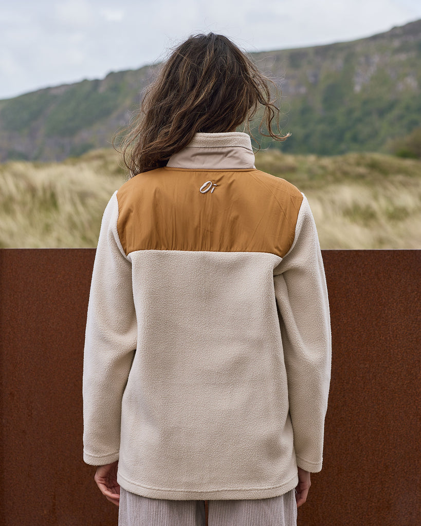 Oatmilk & Walnut borg fleece with 1/4 zip, nylon contrast, and side pockets