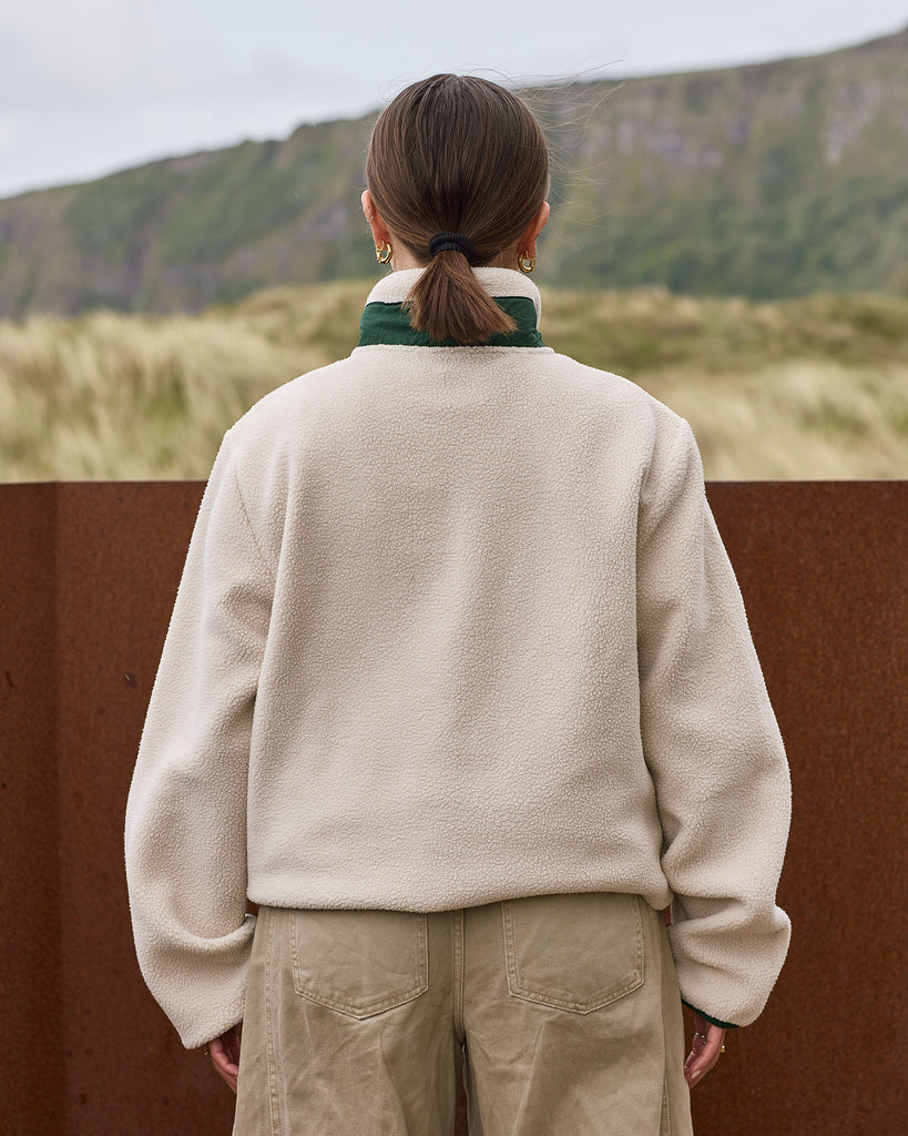 Oatmeal and Sage borg fleece with 1/4 zip, nylon contrast, and side pockets