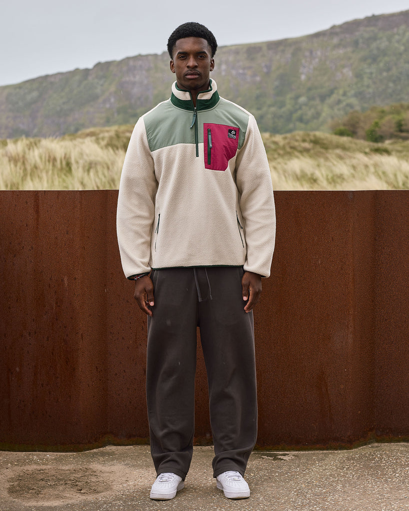 Oatmeal and Sage borg fleece with 1/4 zip, nylon contrast, and side pockets