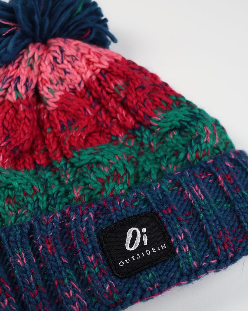 Retro Pop Pom hat with partial faux shearling lining and acrylic knit