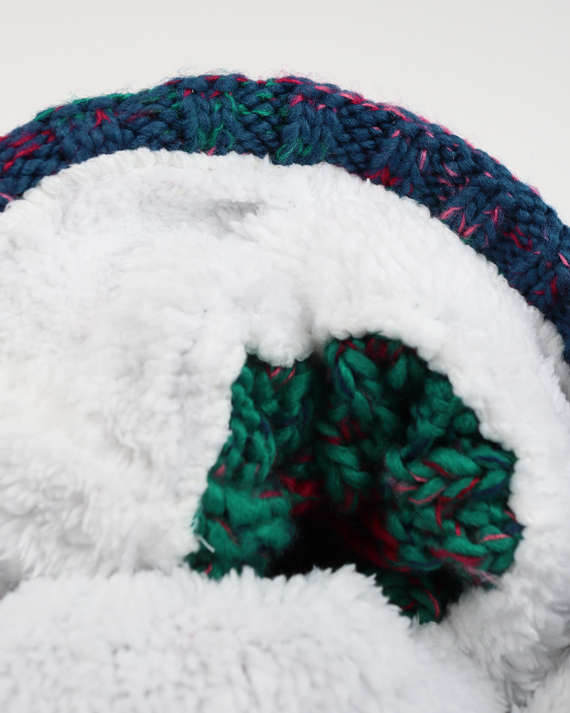 Retro Pop Pom hat with partial faux shearling lining and acrylic knit