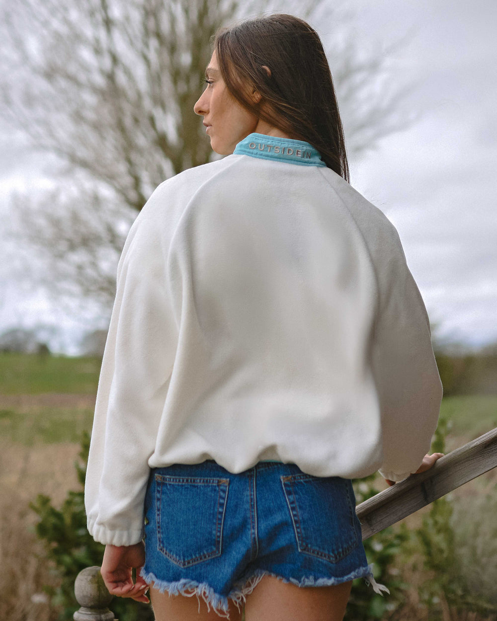 Model wearing OutsideIn Salt Air Liner Fleece.